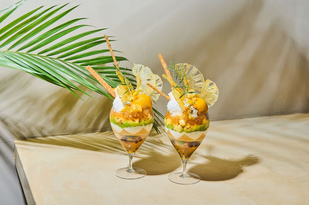 「IWAI OMOTESANDO（以下IWAI）」は6月15日、「パーラーイワイ」を開催する。今回は、トロピカルフルーツを主役とした季節のパフェを提供する。
