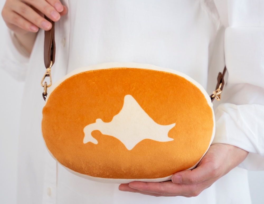「北海道チーズ蒸しケーキ ほんものみたいなふわふわポーチBOOK」限定特典ポーチのイメージ