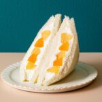 「サンドイッチハウス メルヘン」で販売されるグランスタ限定「清水白桃と黄桃のヨーグルト風クリーム」1パック・税込み928円