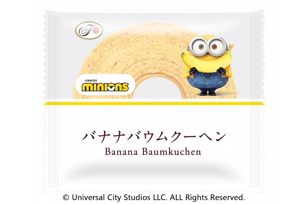 不二家洋菓子店などで7月22日より全国発売される「ミニオン バナナバウムクーヘン」税込み216円