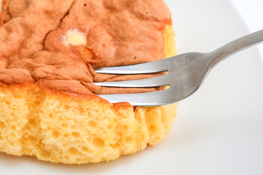 「7プレミアム　とろっと食感カスタードのカステラケーキ」イメージ