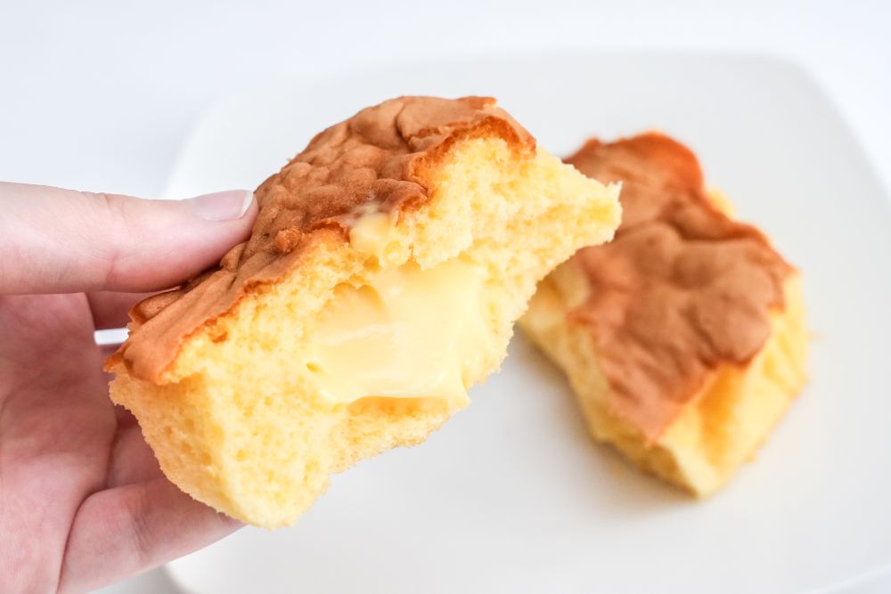 「7プレミアム　とろっと食感カスタードのカステラケーキ」イメージ
