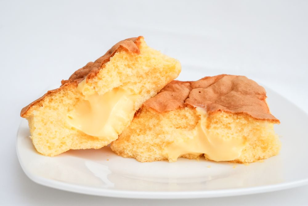 「7プレミアム　とろっと食感カスタードのカステラケーキ」イメージ
